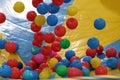 colorful balloons being blown overhead-