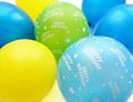 Colorful Balloons In Blue Yellow Apple Green And Turquoise With Happy Birthday Text