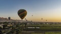 Colorful balloons fly at dawn over the Nile Valley. Royalty Free Stock Photo