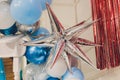 Colorful balloons in room prepared for birthday party. Royalty Free Stock Photo