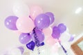 Colorful balloons in room prepared for birthday party Royalty Free Stock Photo