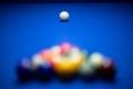 Colorful balls on a blue pool table. Set up and ready to play. Selective focus Royalty Free Stock Photo