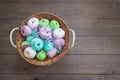 Colorful balls of wool yarn in a basket on the rustic background Royalty Free Stock Photo