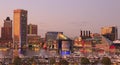 Colorful Baltimore skyline over the Inner Harbor at dusk Royalty Free Stock Photo