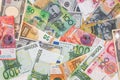 Colorful banknotes of different countries as background close up Royalty Free Stock Photo