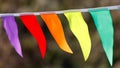 A colorful banner with flags hanging from a string Royalty Free Stock Photo