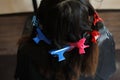 Colorful barrettes in hair