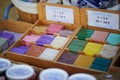 Colorful bars of Marseille soap on market or in souvenir shop