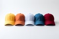 Colorful baseball caps on white background. Clipping path included Royalty Free Stock Photo