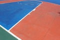 Colorful basketball lines on an outdoor court