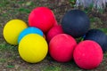 Colorful basketballs balls on green field close up Royalty Free Stock Photo