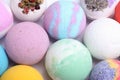 Colorful bath bombs on white background, above view