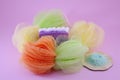 Colorful bath sponge with peeling soap and sea salt Royalty Free Stock Photo