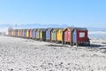 Colorful bathing cabins on the beach in Muizenberg in Cape Town, South Africa