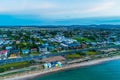 Colorful beach boxes and luxury houses on Mornington Peninsula. Royalty Free Stock Photo