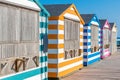 Colorful beach cabanas taken at the beach in Hastings, UK. Royalty Free Stock Photo