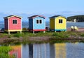 Colorful beach huts in Cavendish