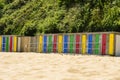Colorful beach huts in a row - horizontal Royalty Free Stock Photo
