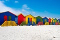 Colorful beach huts, St. James, South Africa. Beautiful white sand on wide beach. Royalty Free Stock Photo