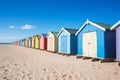 Colorful beach huts on sunny day with blue sky Royalty Free Stock Photo