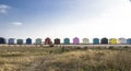 Colorful Beach Huts On A Sunny Day