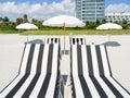 Colorful beach lounge chairs Royalty Free Stock Photo