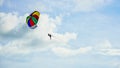 Colorful beach parachute in the sky Royalty Free Stock Photo