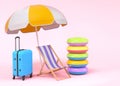 Colorful beach rings, chair, umbrellas and lugagge on pink background.