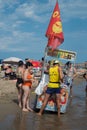 Colorful beach seller of ice cream and drinks standing on the beach