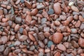 Colorful beach stones in the waves along the North Shore of Lake Superior, closeup, Minnesota, North Shore, background, texture Royalty Free Stock Photo