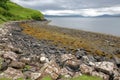 The colorful beach of Tianavaig Bay close to Camastianavaig, Isle of Skye, Highlands, Scotland, UK Royalty Free Stock Photo