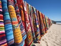 Colorful Beach Towels Drying on Clothesline with Ocean and Blue Sky Background Royalty Free Stock Photo