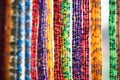 colorful bead curtain hanging in front of a window