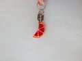 Colorful bead key chain on a white background
