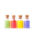 Colorful beads in the bottles Royalty Free Stock Photo