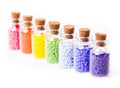 Colorful beads in the bottles Royalty Free Stock Photo