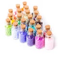 Colorful beads in the bottles Royalty Free Stock Photo