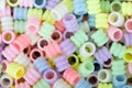 Colorful beads for neck and handlaces, soft focus. Royalty Free Stock Photo