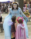 A colorful beautiful girl dressed as a fairy at the annual Bristol Renaissance Faire Royalty Free Stock Photo