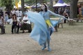 A colorful beautiful girl dressed as a fairy at the annual Bristol Renaissance Faire