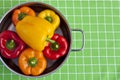 Colorful bell peppers in a pot. Royalty Free Stock Photo