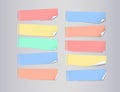 Colorful bended notebook paper sheets for note or message on gray background