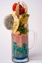 Colorful berry cokctalis, smoothies and milkshakes with fresh fruit and berries