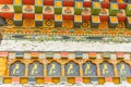 Colorful Bhutan temple roof detail. Beautiful decorations on windows and doors, traditional Bhutanese architecture.