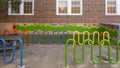 Colorful bicycle racks and caterpillar painting outside Mount Auburn School in Dallas, Texas.