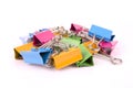 Colorful binder clips on white background