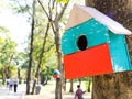 Colorful Bird Houses in the park Hanging on a tree, The bird house was placed at various points.birdhouse forest with many