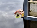 Colorful Birdhouse Over Water Royalty Free Stock Photo