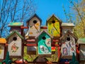 Colorful birdhouses handmade with a painting