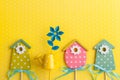 Colorful Birdhouses On Yellow Polka Dot Background
